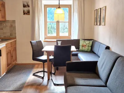 Wohnküche mit Eßecke, Schlafsofa