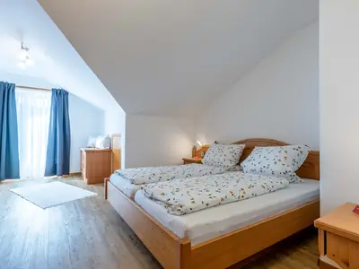 Schlafzimmer mit Balkon