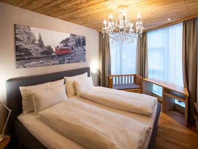 Schlafzimmer 1 - PILATUSKing size - 200 x 200 cm und Babybett