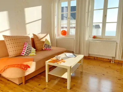 Wohnzimmer mit Schlafsofa