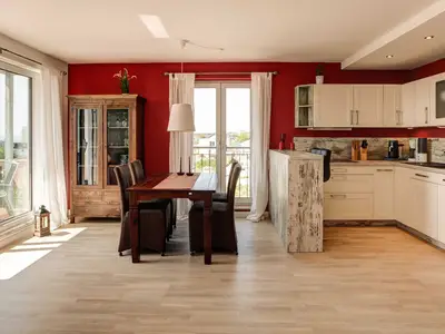 Wohnzimmer mit offener Küche