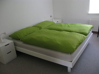 Schlafzimmer mit Doppelbett