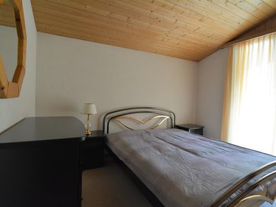 Schlafzimmer mit Balkon