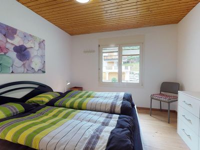 Schlafzimmer mit Doppelbett