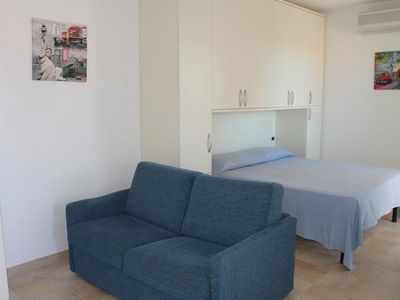 Einzimmerwohnung mit bedeckter Terrasse