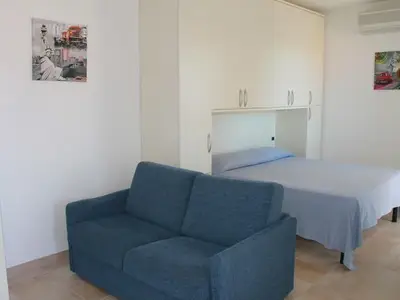 Einzimmerwohnung mit bedeckter Terrasse