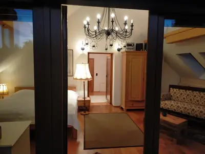 Blick vom Balkon in den Schlaf-Wohnbereich