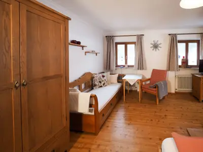 Schlaf- und Wohnraum Ferienwohnung Geigelstein