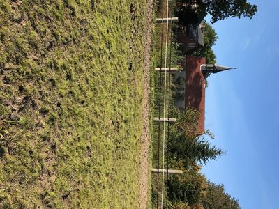 Reitplatz vor der St.Rochus Kirche zu Schlichting