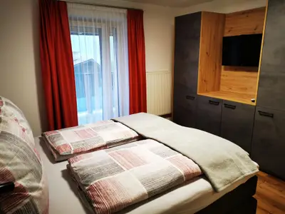 Schlafzimmer mit Balkon