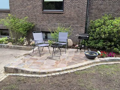 Sitzgelegenheit mit Grill