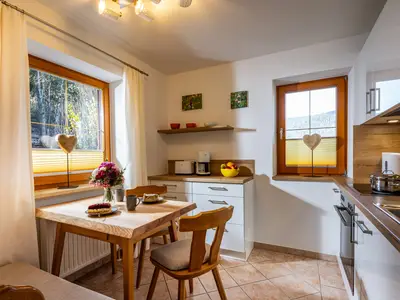 Küche mit gemütlicher Sitzecke