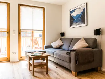Wohnbereich mit gemütlichem Sofa design fewo