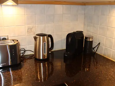 Küchenutensilien / Nespresso-Kaffeemaschine