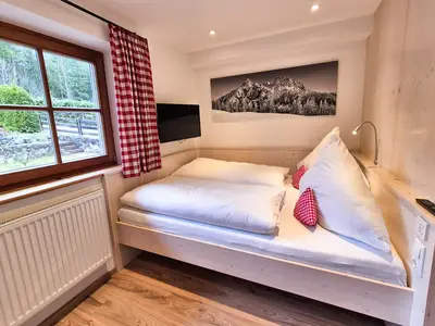Schlafzimmer Ferienwohnung Saletalm