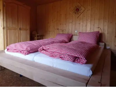 Schlafzimmer in der Löwenzahnwohnung auf dem Farnbauernhof