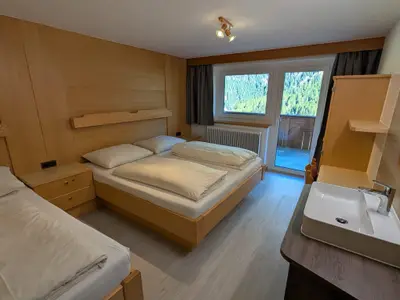 Dreibettzimmer