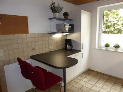 Küche mit Frühstücksbar Küche mit Frühstücksbar