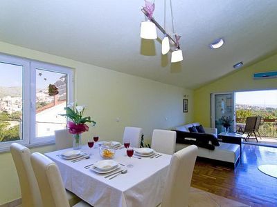 Living room is connected  with kitchen and balcony.