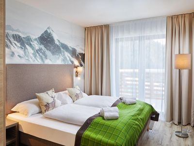 Alpenwohnen.L - Schlafzimmer - Wohnbeispiel