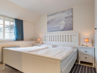 Schlafzimmer mit Doppelbett