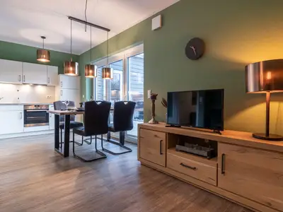 TV, Essbereich und Küche