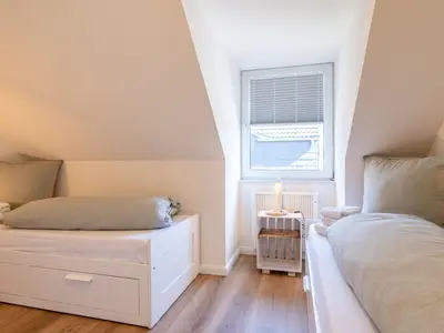 Schlafzimmer mit Einzelbetten