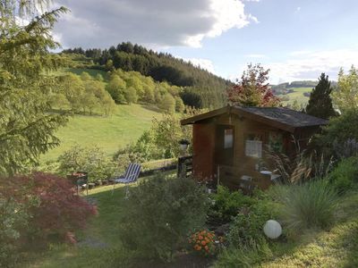 Gartenhaus mit Grillplatz