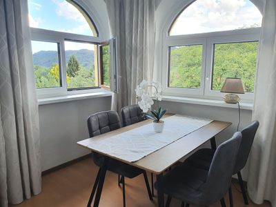 Lesezimmer/Loggia mit Sitzecke Familienappartement