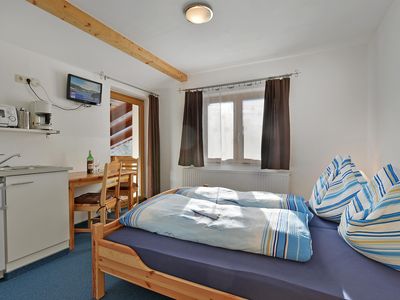 Appartement Kitzbüheler Horn Wohnküche und Schlafz