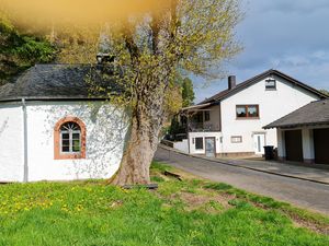 Kapelle mit Ferienhaus