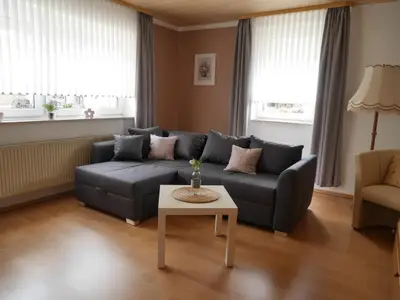 Wohnzimmer mit Schlafsofa