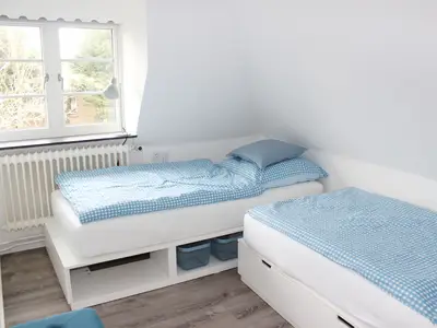 Schlafzimmer 3 in der Ferienwohnung Frisia 5 in Norddorf auf Amrum
