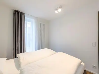 Schlafzimmer mit Doppelbett