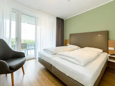 Schlafzimmer mit Doppelbett