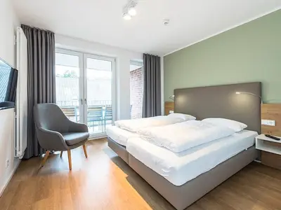 Schlafzimmer mit Doppelbett