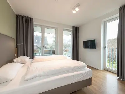 Schlafzimmer mit Doppelbett