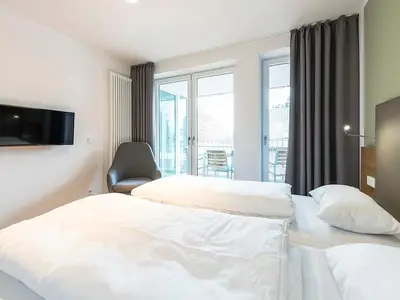 Schlafzimmer mit Doppelbett