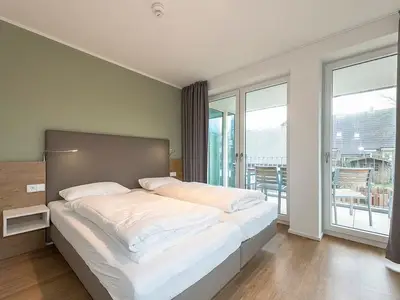Schlafzimmer mit Doppelbett