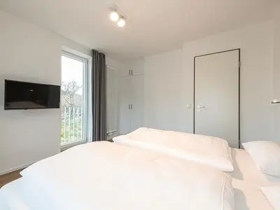 Schlafzimmer mit Doppelbett