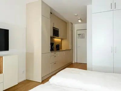 Schlaf-Wohnbereich mit Doppelbett