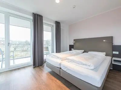 Schlafzimmer mit Doppelbett