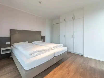 Schlafzimmer mit Doppelbett