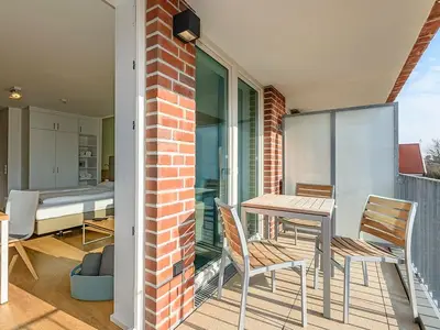 Balkon mit Gartenmöbeln
