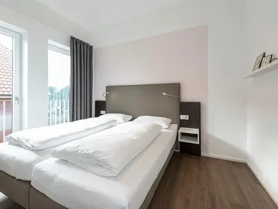 Schlafzimmer mit Doppelbett