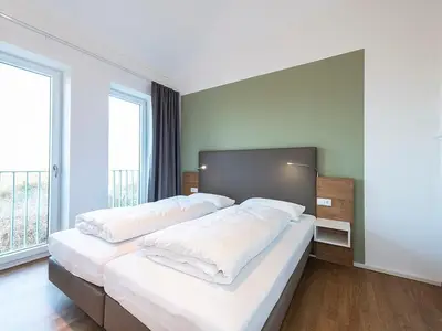 Schlafzimmer mit Boxspringbett