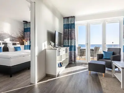 Wohn-/Essbereich mit Zugang zum Schlafzimmer
