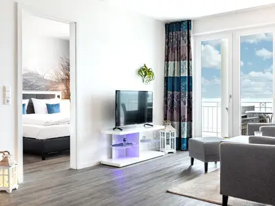 Wohn-/Essbereich mit Zugang zum Schlafzimmer