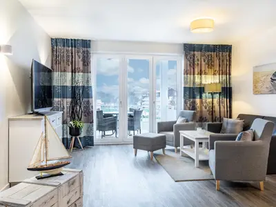 Wohn-/Essbereich mit Zugang zum Balkon