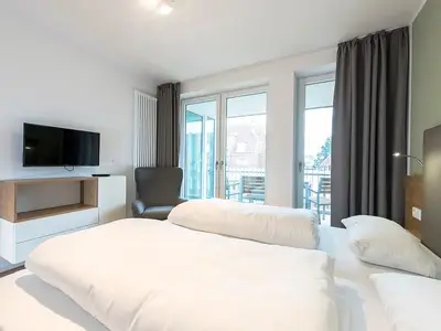 Schlafzimmer mit Doppelbett